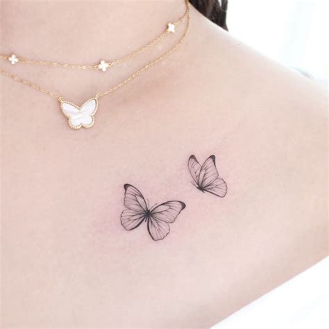 collar bone small butterfly tattoo on chest|Top 10 butterflies on collarbone tattoo ideas and inspiration